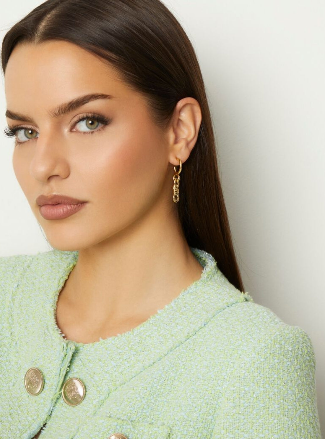 GUESS Accessories Gold Modern Love Knot Drop Earrings JUBE04002JWYGT Model View