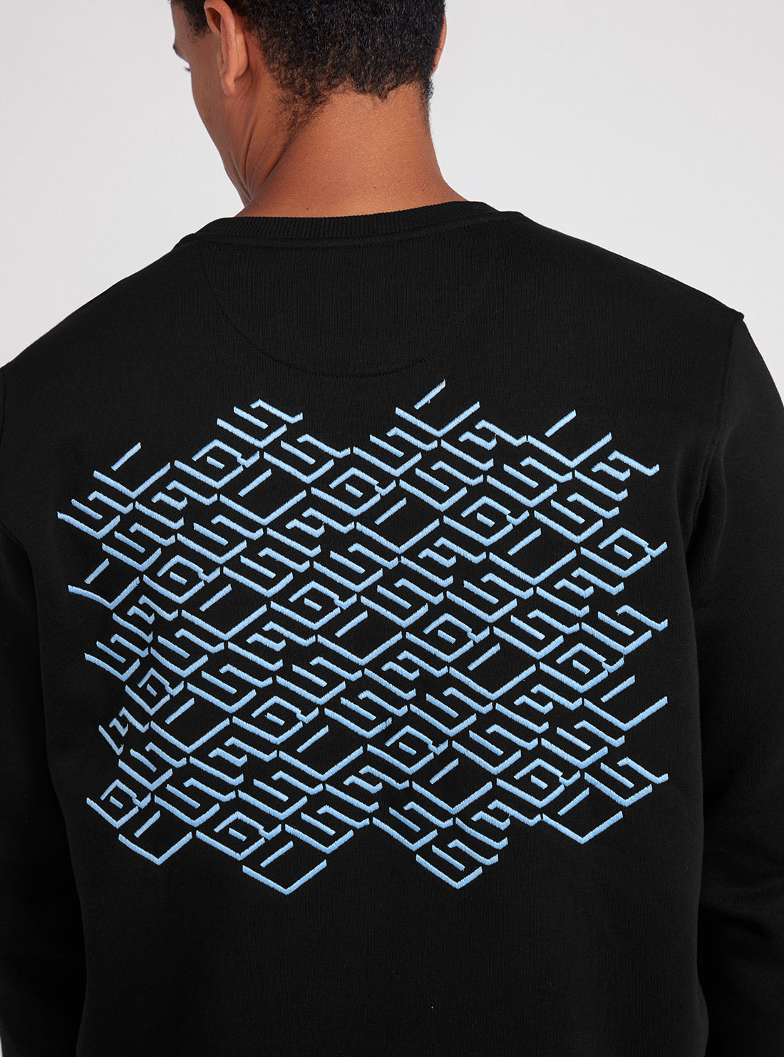 Black Back Geo-Metric Logo Print Jumper | GUESS men's apparel | detailed back view