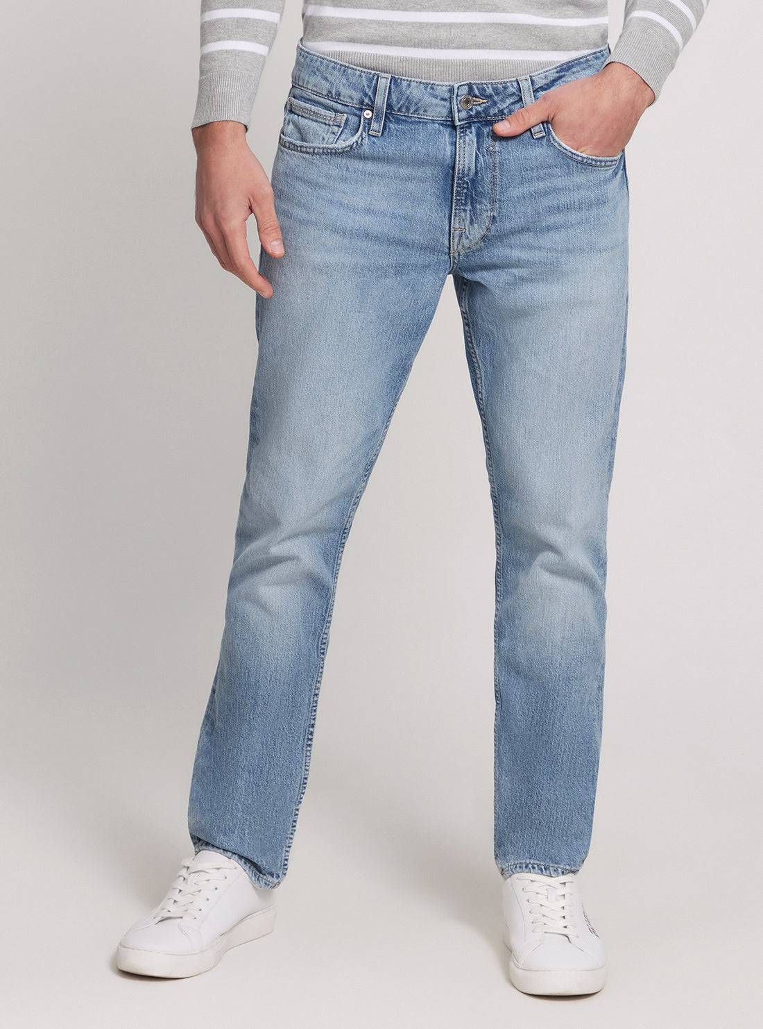 GUESS Low Rise Slim Tapered Denim Jeans in Light Wash front view