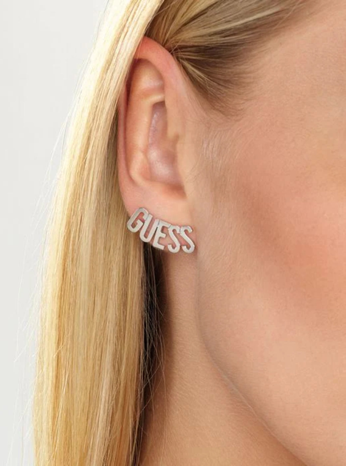 GUESS Womens Silver GUESS Script Stud Earrings UBE20000SLV Model View