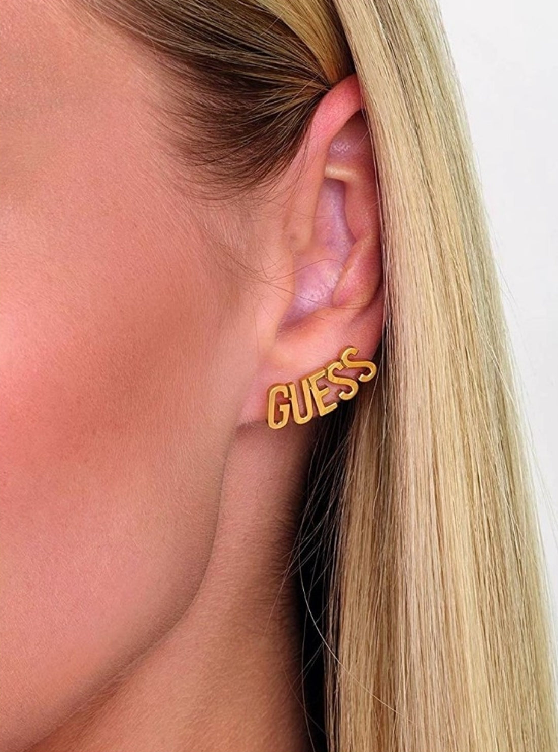 GUESS Womens Gold GUESS Script Stud Earrings UBE20001GLD Model View