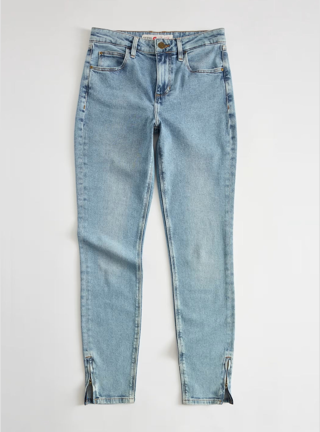 GUESS Womens Mid-Rise Marilyn Anniversary Jeans in Light Wash W6YAJSD2310 Flatlay