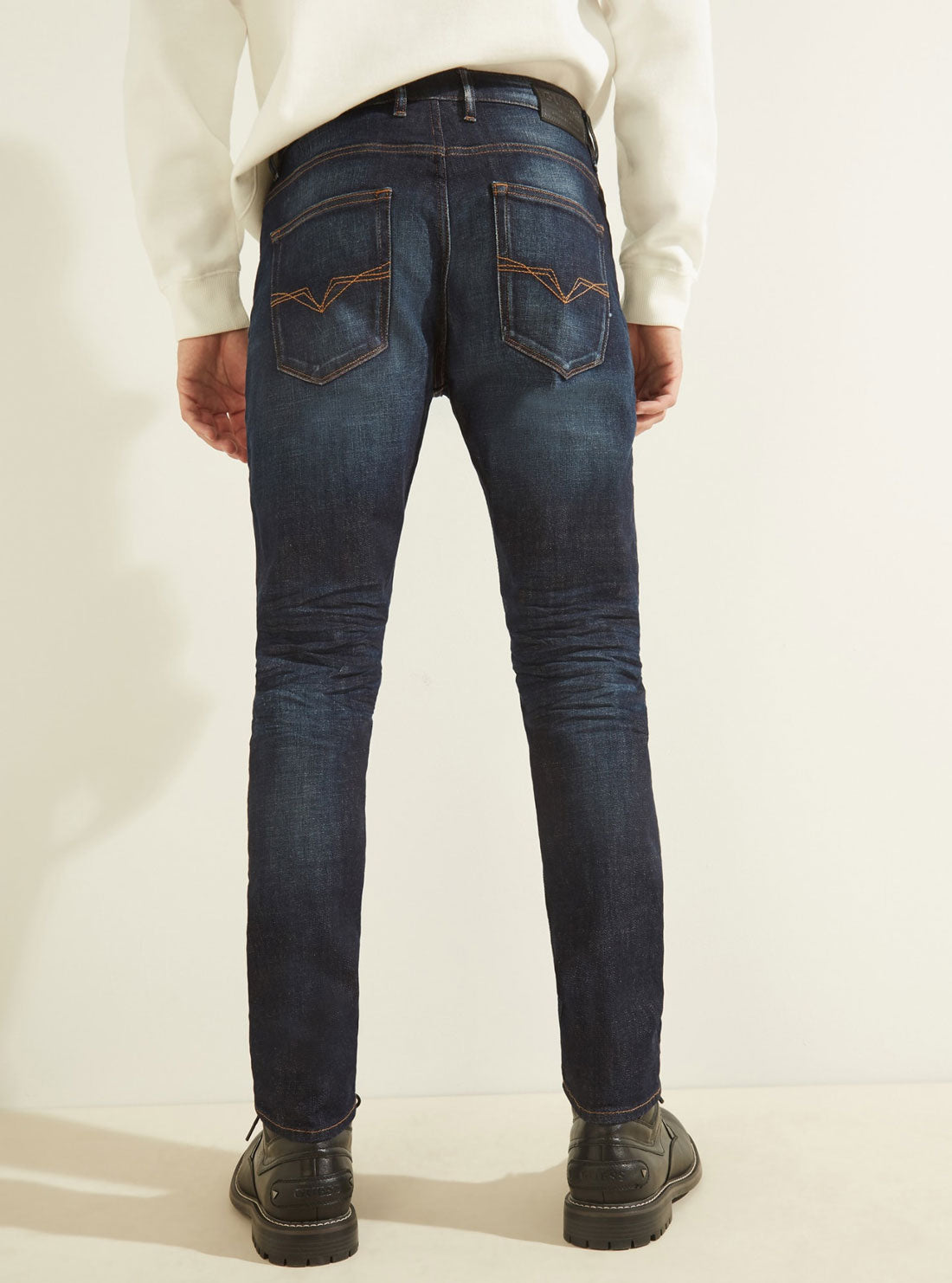 GUESS Mens Mid-Rise Athletic Tapered Denim Jean in Nightshade Wash    MBGAR53041B Back View